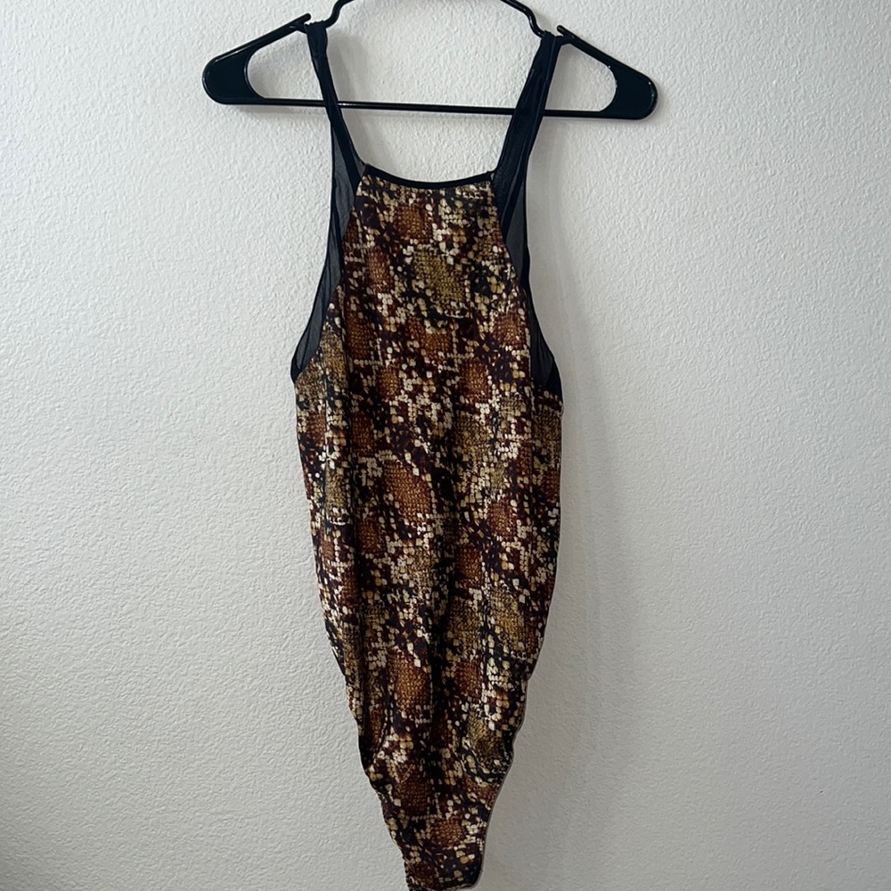 Intimately free snake print bodysuit. Size medium.New without tags.
